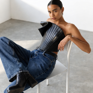 Black leather corset top with jeans — Restrict